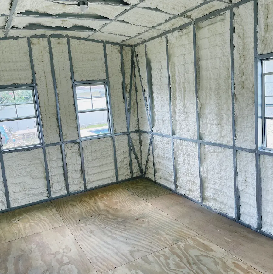 Closed-cell spray foam insulation applied to wall cavities in a residential project in Guymon